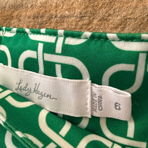 Lady Hagen Green and White Golf Skort. Button accent with pockets front & back - Picture 2 of 4